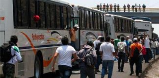 Students 'take' the bus.