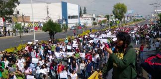 Students march in protest against violence in Celaya.