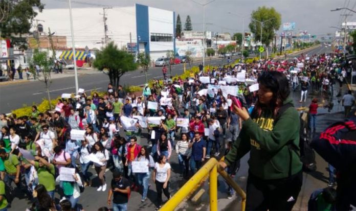 Students march in protest against violence in Celaya.