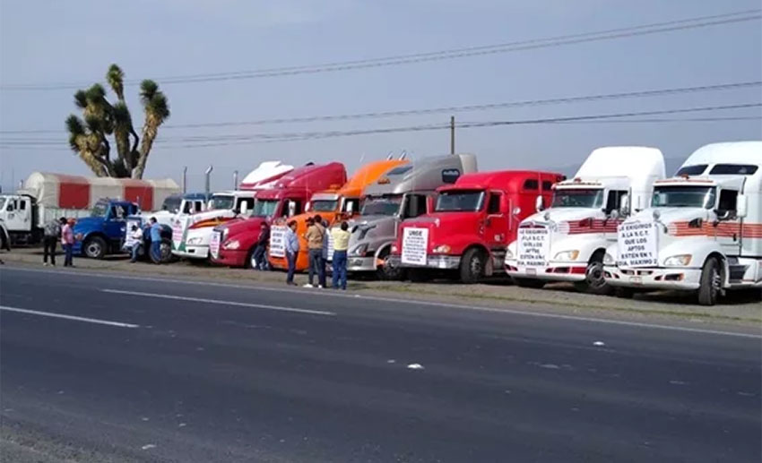 Truckers end national strike after talks with government