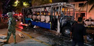 A bus was set on fire during violence Friday in Acapulco.