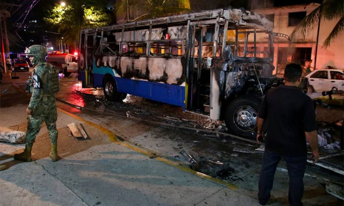 A bus was set on fire during violence Friday in Acapulco.