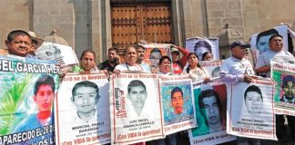 Parents of the missing students outside the National Palace after meeting with the president.