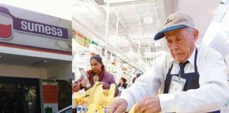 A senior bags groceries at a Sumesa store.