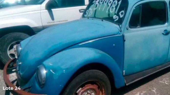 The rusty old narco-Beetle went for 20,000 pesos.