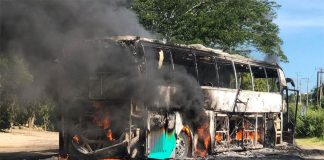 A bus burns on Friday in Petatlán, Guerrero.