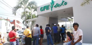 Customers line up to pay their electricity bills in Tabasco