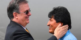 Foreign Secretary Ebrard, left, greets Bolivia's Evo Morales in Mexico City.
