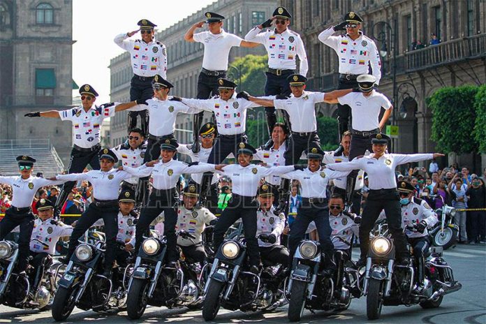 Mexico City traffic police motorcycle acrobatic team gives a demonstration on Sunday.