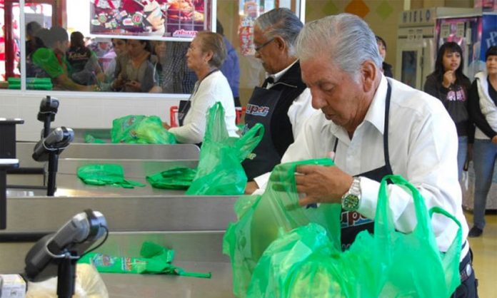 Seniors bag groceries in exchange for tips
