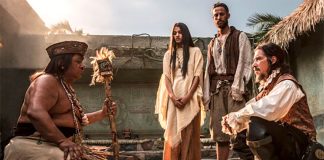 Moctezuma and Hernán Cortés, seated.