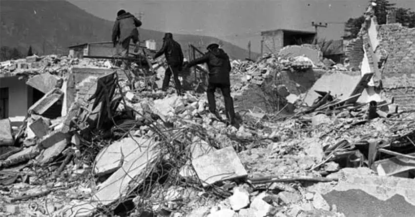 Searchers in the wreckage. More than 500 people were killed.