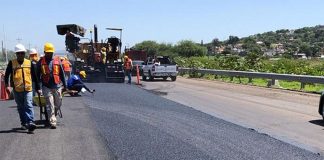 This pavement is made with thousands of used water bottles.