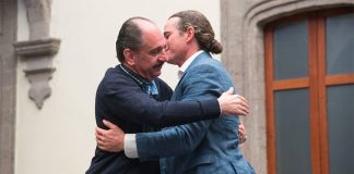 Five hundred years on, a hug between conqueror and conquered. Acosta, left, a descendant of Moctezuma, and Pignatelli, whose ancestor was Cortés.