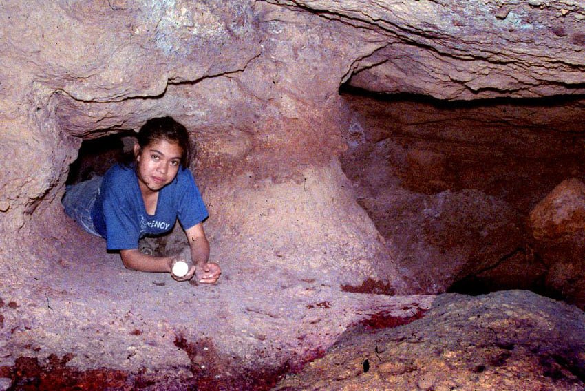 A typical crawlway in Cold Dunk Cave.