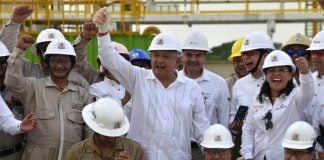 Cheering news: López Obrador celebrates oil discovery with Pemex workers in Tabasco.