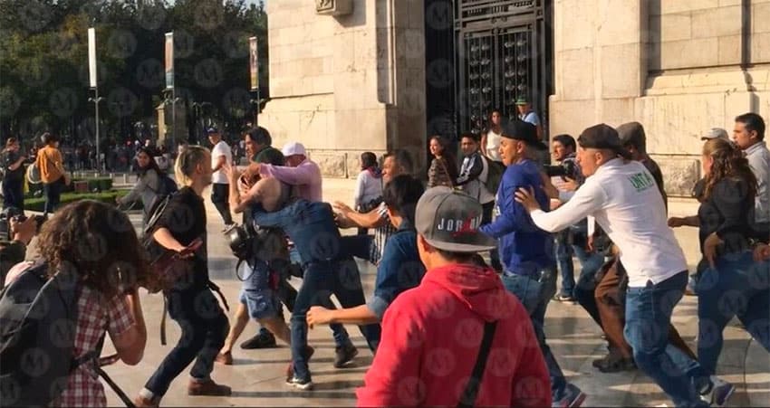 Farmers scuffle with LGBT community during a protest by the former.
