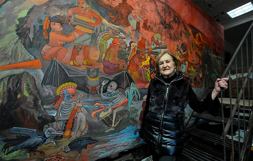 Lazo and one of her murals.