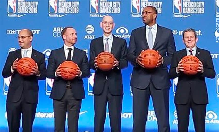 NBA commissioner Adam Silver, center, announces the new G League team. 