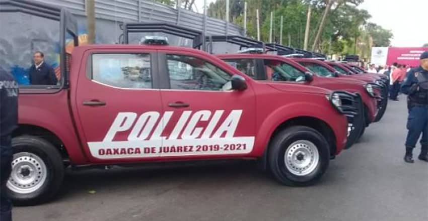 Oaxaca city police vehicles were painted Morena maroon earlier this year.