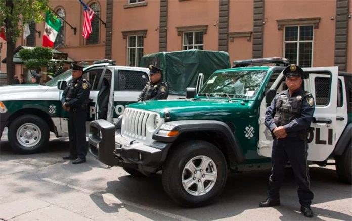 Mexico City police vehicles: colorful but uncoordinated.