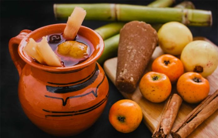 Fruit, piloncillo and cinnamon are among the ingredients in this mug of ponche.