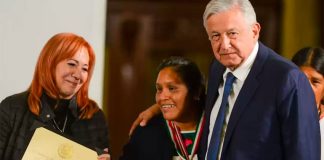 Prize winner Eugenio with rights commission president Piedra and López Obrador.