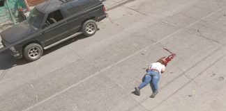 The body of a woman killed in front of a primary school last week.