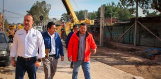 San Miguel's mayor inspects the paving project on Sunday.