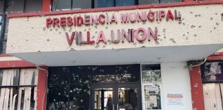 Battle-scarred municipal offices in Villa Unión.