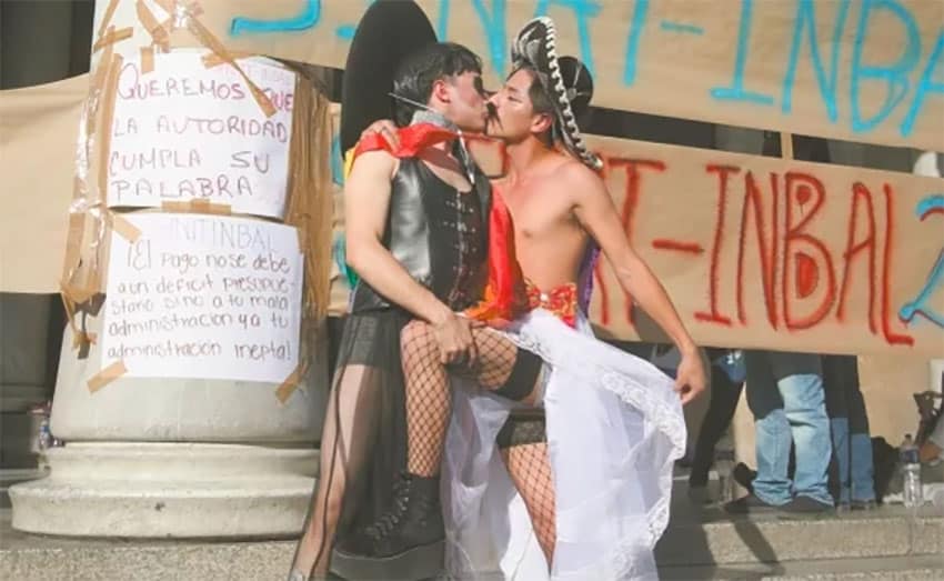 Gay Zapatas kiss in protest in Mexico City.