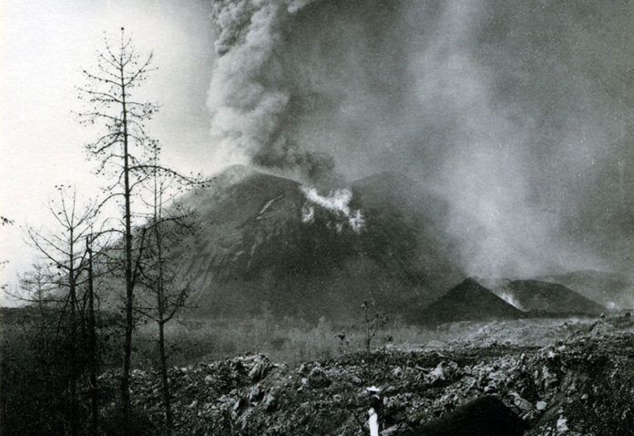 The Paricutín volcano erupting in 1943, photographed by Bodil Christensen.