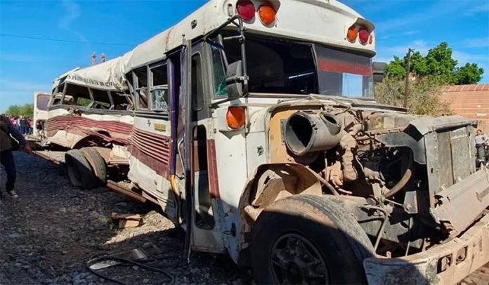 Wreckage of the bus that lost race with train.