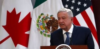 President López Obrador speaks at the signing of an update to the new North American free-trade agreement in Mexico City