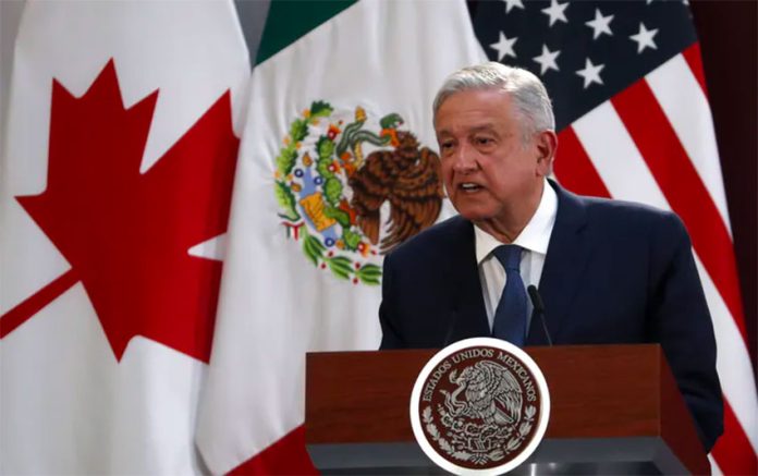 President López Obrador speaks at the signing of an update to the new North American free-trade agreement in Mexico City