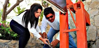 The mayor takes a cutting torch to the controversial beach barrier.