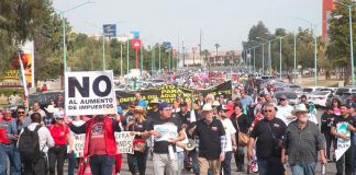 Brewery opponents march in Mexicali on Sunday.