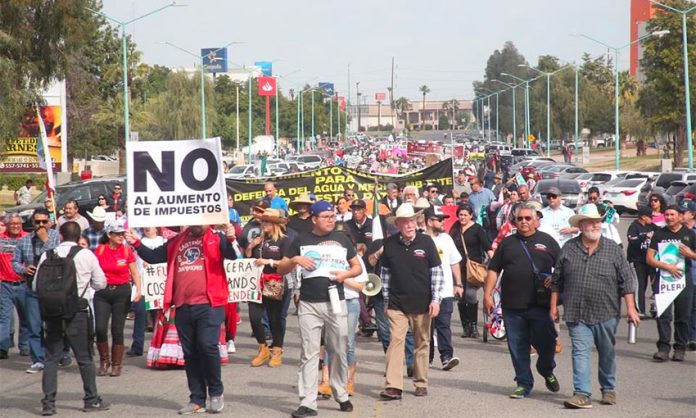 Brewery opponents march in Mexicali on Sunday.