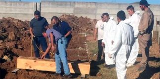 An unclaimed body is buried in Ciudad Juárez.