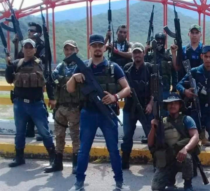 Fernández, standing in foreground, and CJNG sicarios.