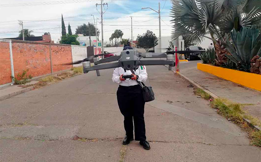A police officer flies one of Irapuato's new drones.