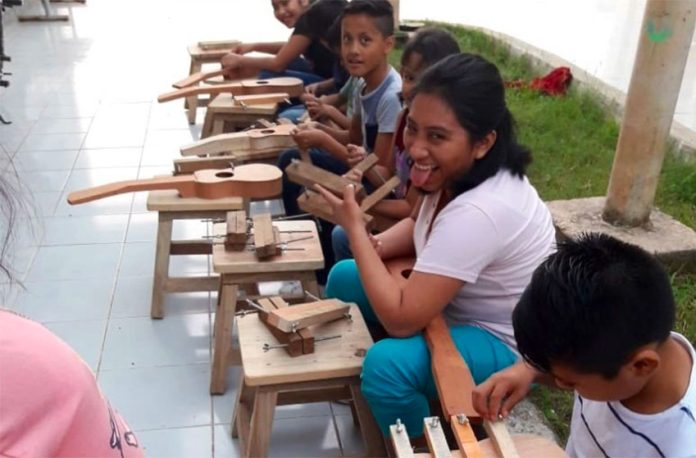 Young instrument makers in Veracruz.