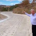 AMLO, right, and Oaxaca Governor Murat inspect the new road.