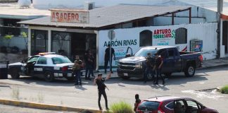 Cartel gangsters control a street corner in Culiacán in October.