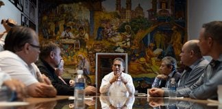 Taxco Mayor Marcos Parra, center, addresses members of the LeBaron family and activist José Díaz Navarro.