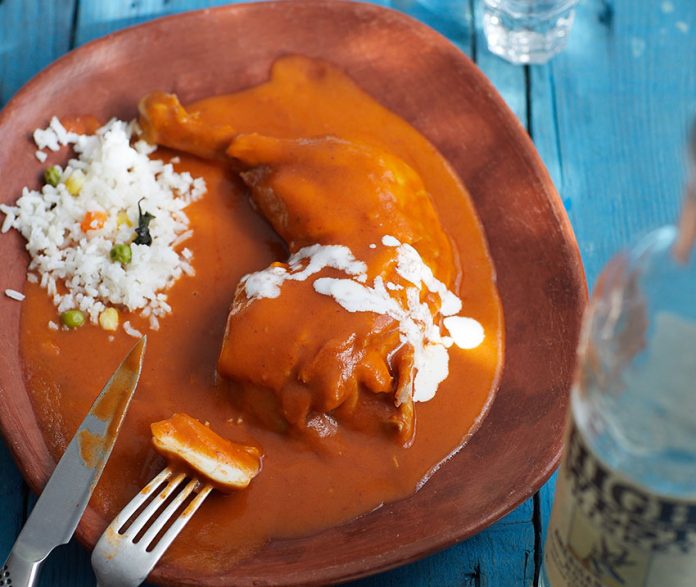 Readers will find a recipe for Pollo Enchipotlado in the new cookbook.