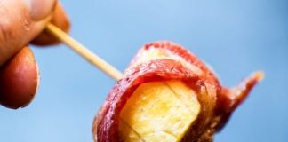 A tasty-looking bacon-wrapped plantain bite.