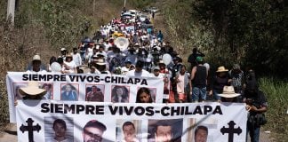 Hundreds of people attend a march to protest against the number of people who have been murdered or disappeared in Guerrero.