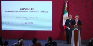 President López Obrador looks on as Deputy Health Minister López-Gatell announces the coronavirus cases.