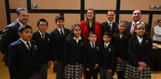 Foundation directors and students celebrate a new agreement to further the teaching of English.